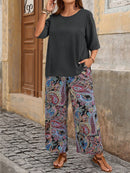 Conjunto camisa em gola redonda e calças de perna larga Ligía